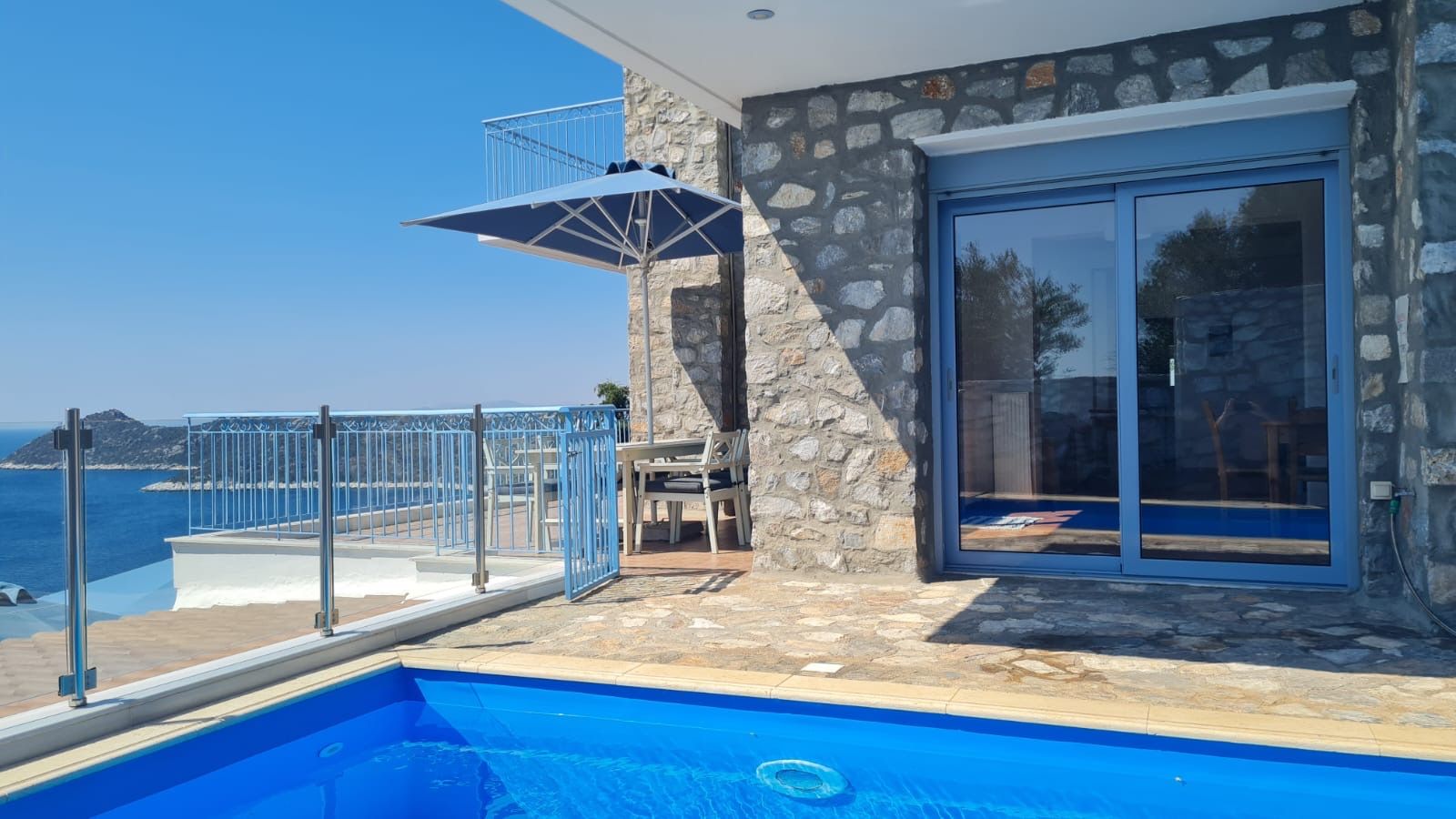 Stone-built terrace beside the pool
