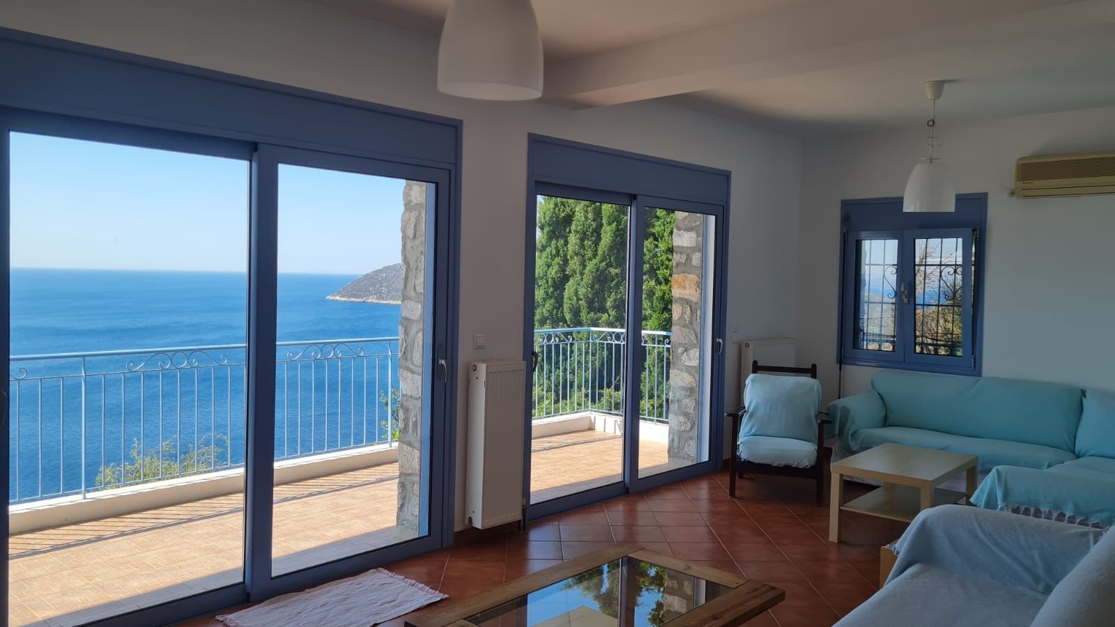 Living room opening onto the Aegean