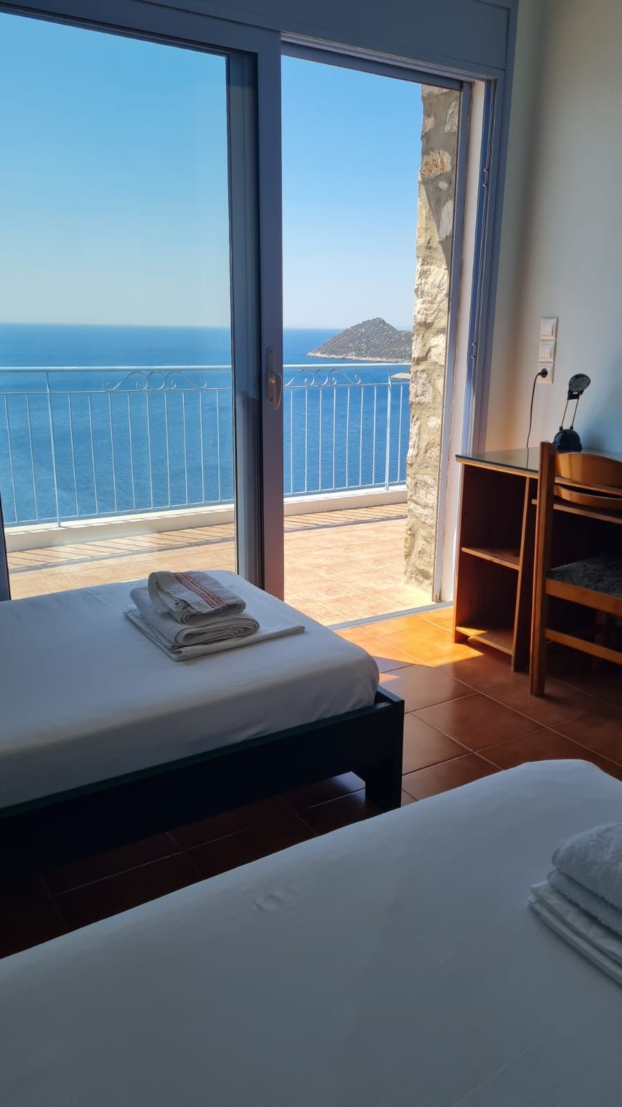 Twin bedroom looking out to the headland